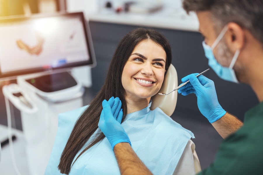patient in dental chair at an Alexandria dentist, dentist in alexandria